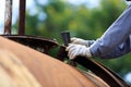 Worker is remove paint by sand paper Royalty Free Stock Photo