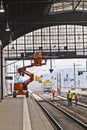 Worker repair the catenary in the station Royalty Free Stock Photo