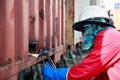 Worker repair container box by gas cutting and welding, Job, wor