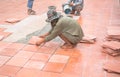 Worker repairing floor