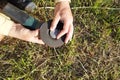 The worker replaces the grinding stone in the angle grinder