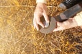 The worker replaces the grinding stone in the angle grinder