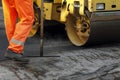 Worker with road roller Royalty Free Stock Photo