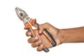 Worker's caucasian male hand holding a plier tool, composition isolated over the white background