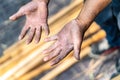 Worker`s hand very hard working in the field of construction carpenter and smith Royalty Free Stock Photo