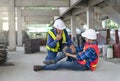 a worker\'s legs was injured at site, a colleague rescued him from accident and using walkie-talkie to call first aid team