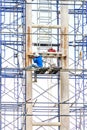 Worker on scaffolding.