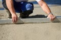 Worker screeding cement floor with screed Royalty Free Stock Photo