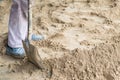 Worker with a shovel working excavator in construction building site Royalty Free Stock Photo