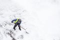 Man shoveling snow, copy space. Top view of snow clearance