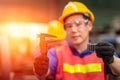 Worker showing Vernier Caliper with Metal Gear for accuracy precision quality control working in factory Royalty Free Stock Photo