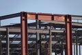 Steel Framing and a Worker on a New Construction Site