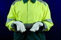 The worker shows his hands in protective gloves, close-up. Safety at work or at the factory, personal protective equipment Royalty Free Stock Photo