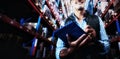 Worker is smiling and holding a clipboard in a warehouse Royalty Free Stock Photo