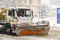 Worker Snow Plow Truck During Heavy Snow Storm In Downtown Bucharest City