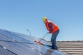 Worker and solar panels