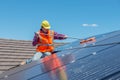 Worker and solar panels