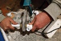 The worker soldered two tubes to heat the floor with a soldering iron Royalty Free Stock Photo