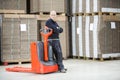 Worker Standing Arms Crossed At Warehouse