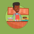 Worker standing behind the counter at the bakery. Royalty Free Stock Photo