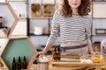 Worker standing behind counter