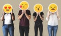 Worker standing and holding face emojis Royalty Free Stock Photo