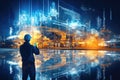 A worker stands in front of a glowing projection of the factory. The plant of future. Double exposure. Royalty Free Stock Photo