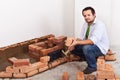 Worker starting building masonry heater Royalty Free Stock Photo