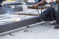 Worker steel welding with unsafety position Royalty Free Stock Photo