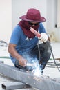 Worker steel welding with unsafety position Royalty Free Stock Photo