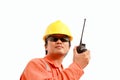 Worker talking on portable radio transceiver Royalty Free Stock Photo