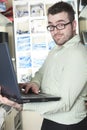 Worker technician at work with computer Royalty Free Stock Photo