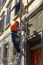 A worker from telecomunication internet provider company working on implementation of fiber optic cables