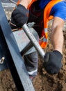 Worker turning the T-wrench