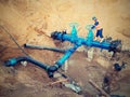 Worker underground for reconstrucion of drink water system. Technical expert at gate valve Royalty Free Stock Photo