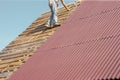Worker on unfinished rooftop Royalty Free Stock Photo