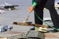 A worker uses a oxygen acetylene cutting