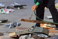 A worker uses a oxygen acetylene cutting