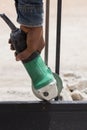 Worker using an angle grinder to grinding door frames Royalty Free Stock Photo