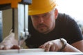 Worker using electric saw portrait Royalty Free Stock Photo