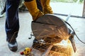 A worker using a fiber machine cutting steel sparks Royalty Free Stock Photo