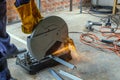 A worker using a fiber machine cutting steel Royalty Free Stock Photo