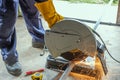 A worker using a fiber machine cutting steel Royalty Free Stock Photo