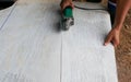 Worker using grinder for cut Concrete slabs with dust in background and copy space ,space for text or images Royalty Free Stock Photo