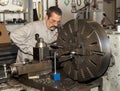 Worker using a Metal Lathe