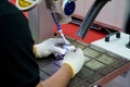 Worker using repair mold and die part by Laser welding machine i