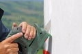 Worker using a saw to cut fibreglass Royalty Free Stock Photo