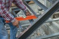 worker using spirit level tool for checking the level of steel Royalty Free Stock Photo