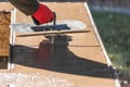 Worker Using Trowel On Wet Cement Forming Coping Around New Pool Royalty Free Stock Photo