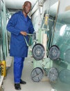 Worker using vacuum glass lifter Royalty Free Stock Photo